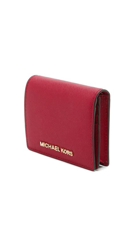 michael kors slim travel wallet|Michael Kors dark cherry wallet.